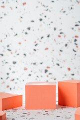 Poster - peach geometric pedestal on terrazzo background with summer sunlight