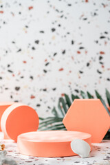 Leinwandbilder - peach geometric pedestal on terrazzo background with summer sunlight and green palm leaf