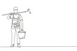 Single one line drawing painter with bucket of paint and paint roller. Professional repairman in overalls on the background of apartment renovation. Modern continuous line draw design graphic vector