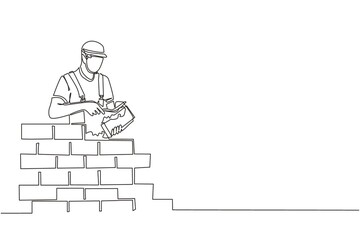 Wall Mural - Continuous one line drawing repairman building brick wall. Construction worker in uniform and helmet doing work. Builder concept. Repair work services. Single line design vector graphic illustration