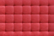 Red suede leather background for the wall in the room. Interior design, headboards made of furniture fabric, furniture upholstery. Classic checkered pattern for furniture, wall, headboard