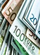 Leinwandbild Motiv Fondo con textura y detalle de billetes de euro