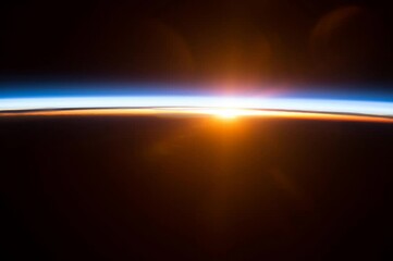 Wall Mural - colorful sunrise motion background. elements of this image furnished by nasa.