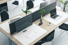 Close Up And Top View Of Creative Wooden Designer Workplace With Computer Screen, Partition, Coffee Cup, Decorative Plant And Supplies. 3D Rendering.