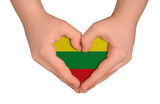 Fototapeta Tęcza - Kid's hands in heart- form. National peace concept on white background. Lithuania