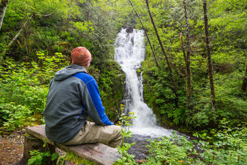 Poster - Hiker near waterfall