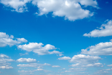 Wall Mural - White clouds in blue sky.