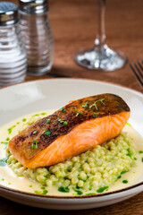 Wall Mural - Cedar plank grilled or roasted salmon with herbs and spices