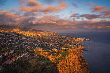 Wall Mural - Panoramic top view on Funchal at sunset time. Madeira, Portugal. October 2021