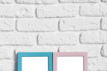 Wall Mural - Photo frame with copy space against white brick wall