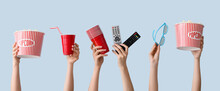 Many Hands With Popcorn, Cups, Remote Controls And 3D Eyeglasses On Color Background