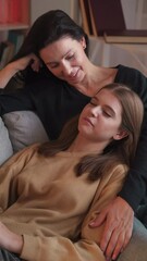 mother care. family love. close relationship. happy middle-aged woman talking with teenage daughter 