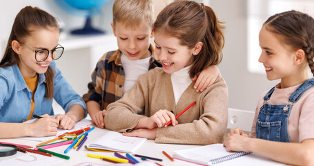 Diligent girl speaking with classmates