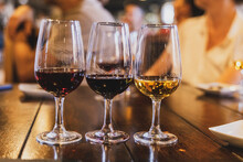 Three Glasses Of Port Wine In Wine Glasses At A Wine Tasting