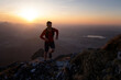 © Westend61 - Man running on Sauling mountain peak