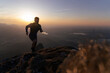 © Westend61 - Silhouette hiker running on mountain at sunset