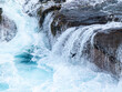 © robertharding - Southern rockhopper penguins (Eudyptes chrysocome), jumping in huge waves to sea on New Island