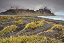 The black sand dunes and cliffs of Vestrahorn seen from Stokksnes, near Hofn, southeast Iceland