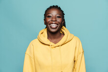 Young Black Woman Wearing Hoodie Laughing At Camera