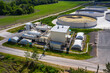 Livestock farm. Manure tanks and a methane production plant. Aerial view.
