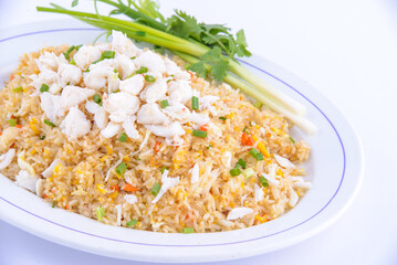 Wall Mural - Crab fried rice on the white dish. Favorite food of Thailand.