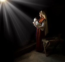 Mary In The Stable Near The Manger With The Baby