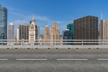 Empty urban asphalt road exterior with city buildings background. New modern highway concrete construction. Concept of way to success. Transportation logistic industry fast delivery. Chicago. USA.