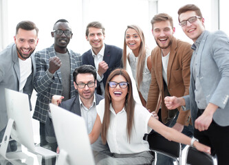 Canvas Print - happy business team in the workplace.