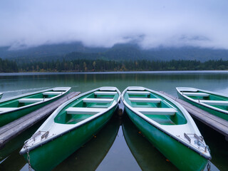 Wall Mural - boats on the hintersea lake, germany. landscape during fog. lake and trees. rental boats. high-resol