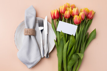 Wall Mural - Festive Table Setting With Tulips. Holiday Table Set for Birthday, Mother's Day or for another holiday.