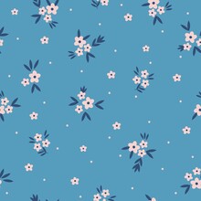 Simple Vintage Pattern. Small Pink Flowers And Dots, Dark Blue Leaves. Blue Background. Fashionable Print For Textiles And Wallpaper.
