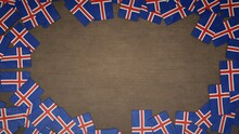 Frame Made Of Paper Flags Of Iceland Arranged On Wooden Table. National Celebration Concept. 3D Illustration