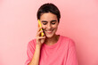© Asier - Young caucasian woman holding mobile phone isolated on pink background