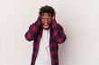 © Asier - Young african american man isolated on white background  covering ears with hands trying not to hear too loud sound.