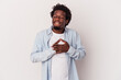 © Asier - Young african american man isolated on white background  has friendly expression, pressing palm to chest. Love concept.