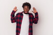 © Asier - Young african american man isolated on white background  being shocked due to an imminent danger