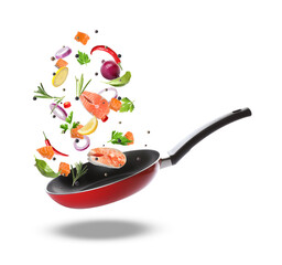 Tasty fresh ingredients and frying pan on white background