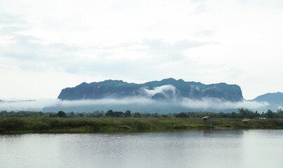 Thailand view of Phuphaman Khonkean province with mountain and foggy cloud after rain in rainy season. local location for holidays.