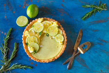 Wall Mural - Appetizing beautiful lemon muffin in a light key, beautiful still life with a delicious cake on the table. Sweet delicacy in the pastry shop. lime dessert bakery products