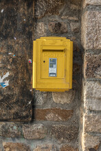 Yellow Post Box On A Road In The French Pyrenees