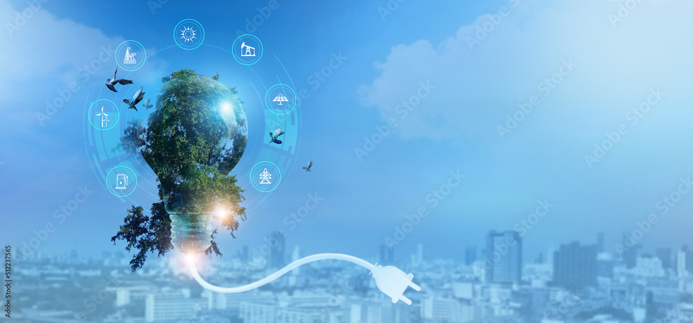 Light bulb with green tree inside with energy resources icon ...