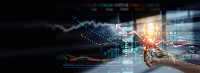 Poster - Businessman hold bright idea light bulb with growth graph and success in stock market investment. Inspiration for business strategy solution on financial management and smart data analysis.