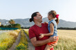 © Алина Битта - Happy father and child daughter spending time outdoors. Fathers Day.