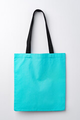 Wall Mural - Empty fabric shopping bag on white background