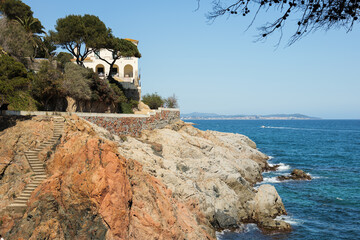 Famous spanish track - cami de ronda, by the mediterranean sea in Costa Brava, S Agaro, Catalonia, Spain.