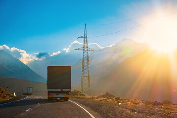 Wall Mural - Truck driving on a mountain road