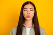 Portrait of young adorable stunning girlfriend go on date kiss her boyfriend isolated on yellow color background