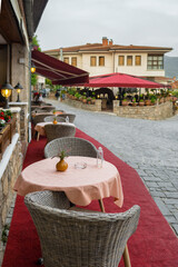 Wall Mural - Cozy outdoor cafe in old town of Ohrid, North Macedonia