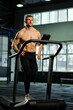 © Guys Who Shoot - Male athlete running on a treadmill
