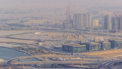 Wall Mural - Bussy traffic on the overpass intersection in Dubai downtown aerial timelapse.